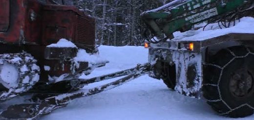 Перевозка трактора ТТ-4 на лыжах зимой